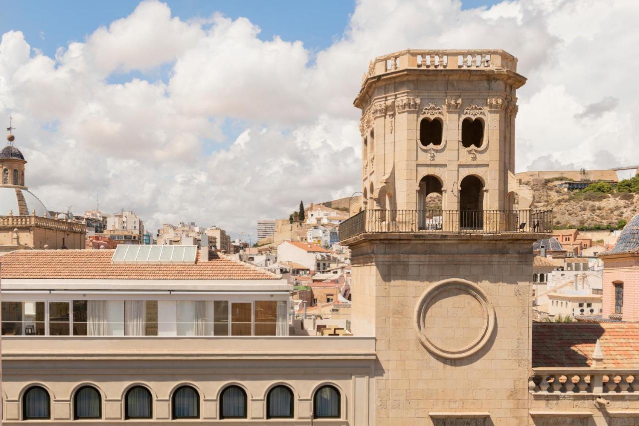 Eurostars Portico Alicante Exterior foto The bell tower of the church